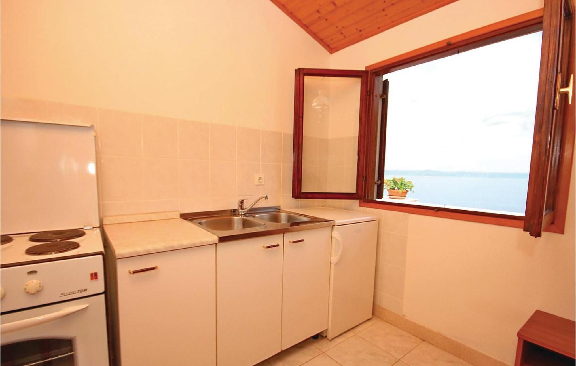 Gorgeous Apartment In Prigradica With Kitchen Exterior photo